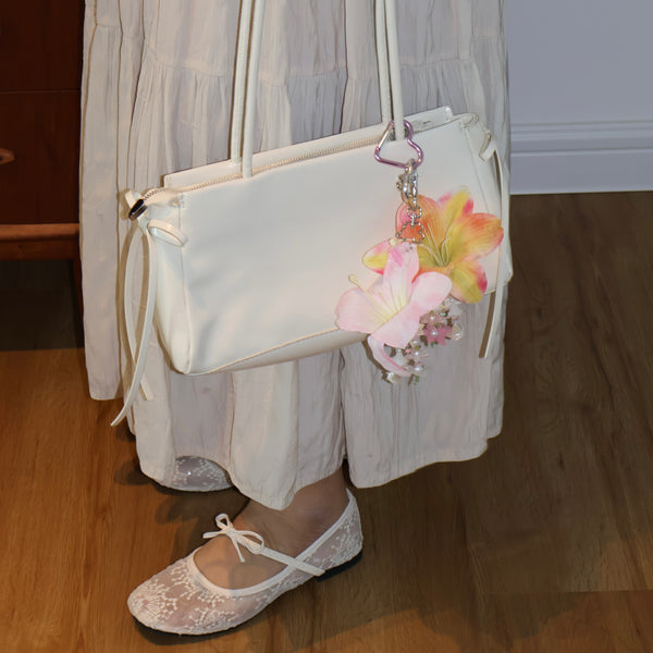 Lily Handmade Bag Charm hover